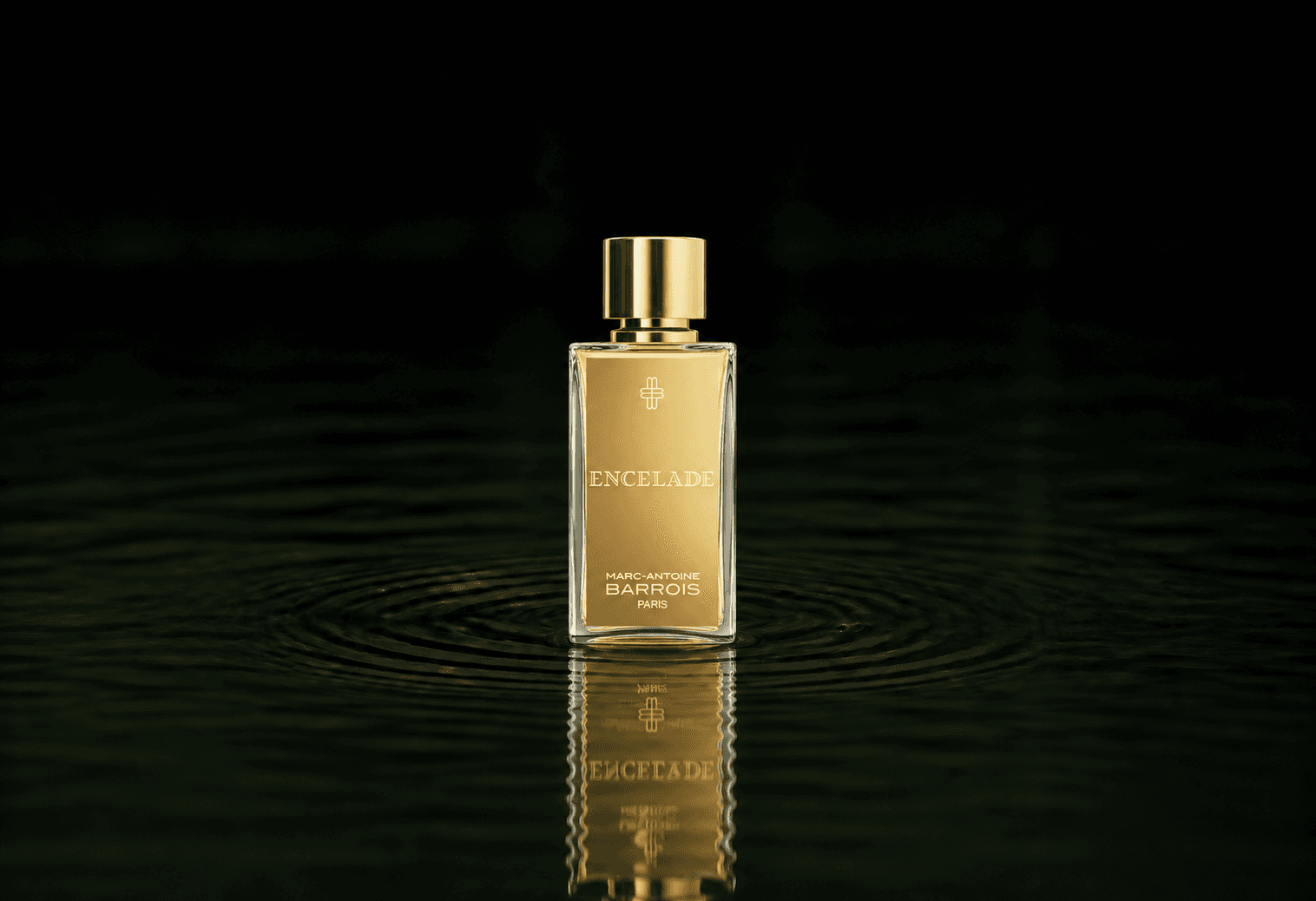 Marc-Antoine Barrois Marc Antoine Barrois - Encelade fragrance bottle floating above dark water