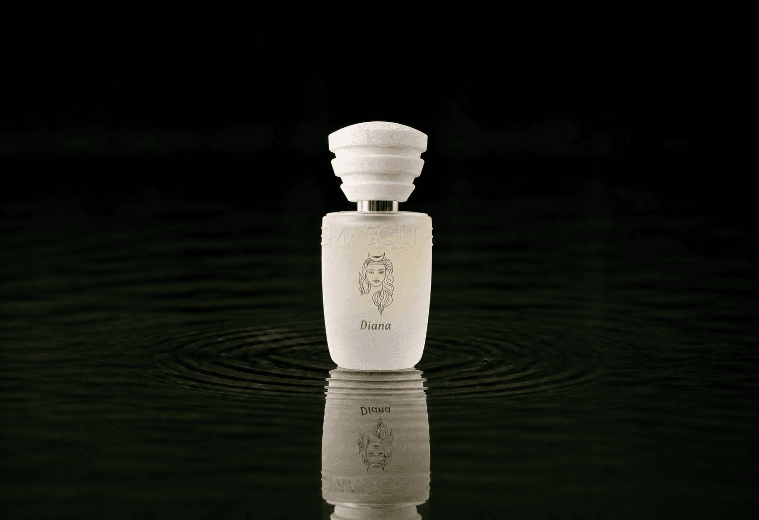 Masque Milano Diana fragrance bottle floating above dark water