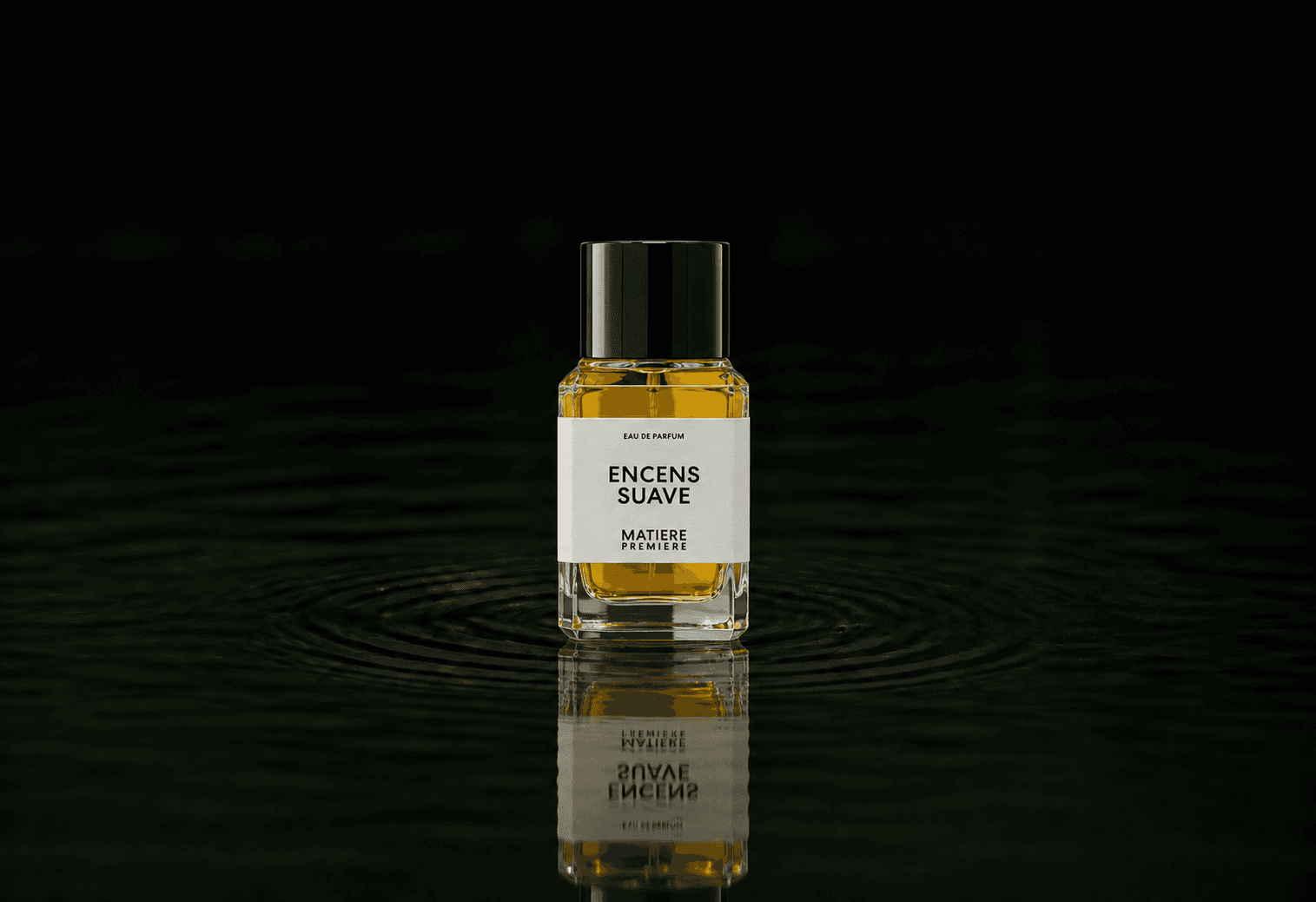 Matiere Premiere Encens Suave fragrance bottle floating above dark water