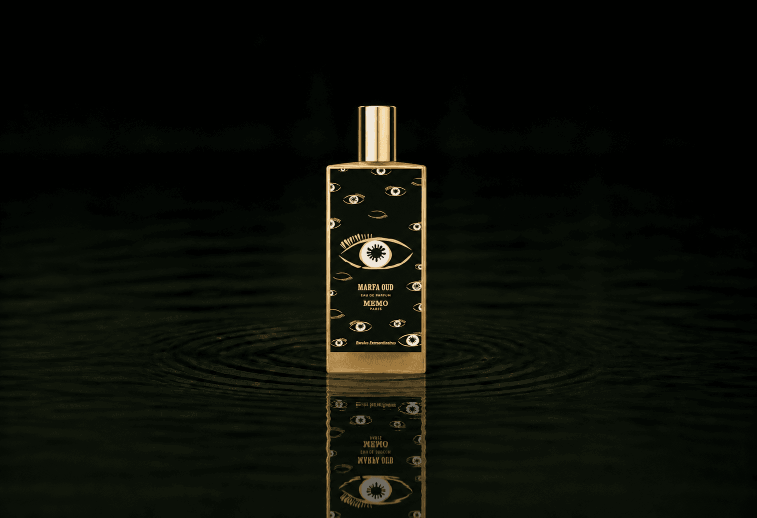 Memo Paris Marfa Oud fragrance bottle floating above dark water