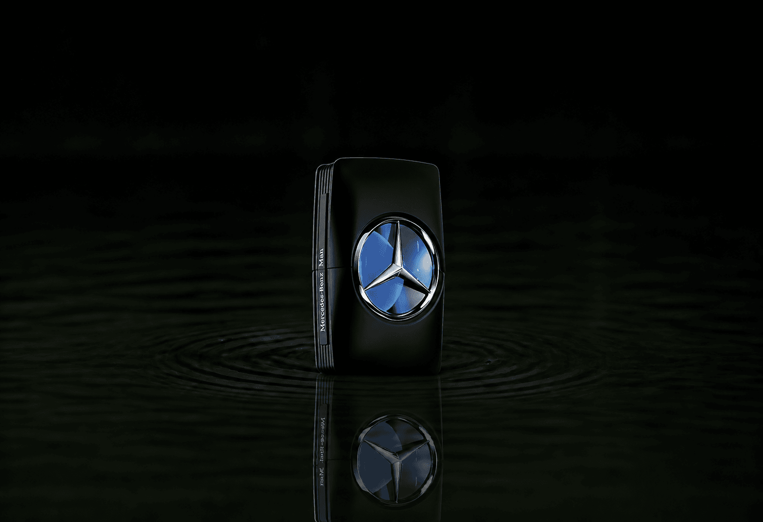 Mercedes Benz Mercedes-Benz For man fragrance bottle floating above dark water