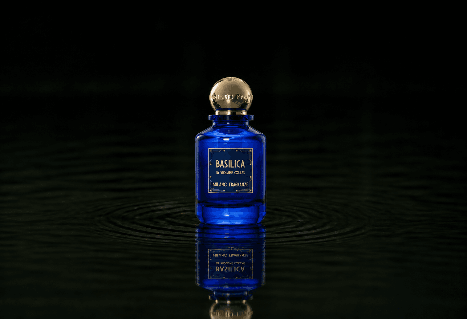 Milano Fragranze Basilica fragrance bottle floating above dark water