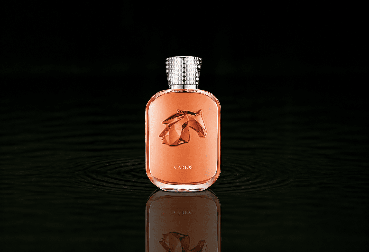 Parfums de Marly Carios fragrance bottle floating above dark water