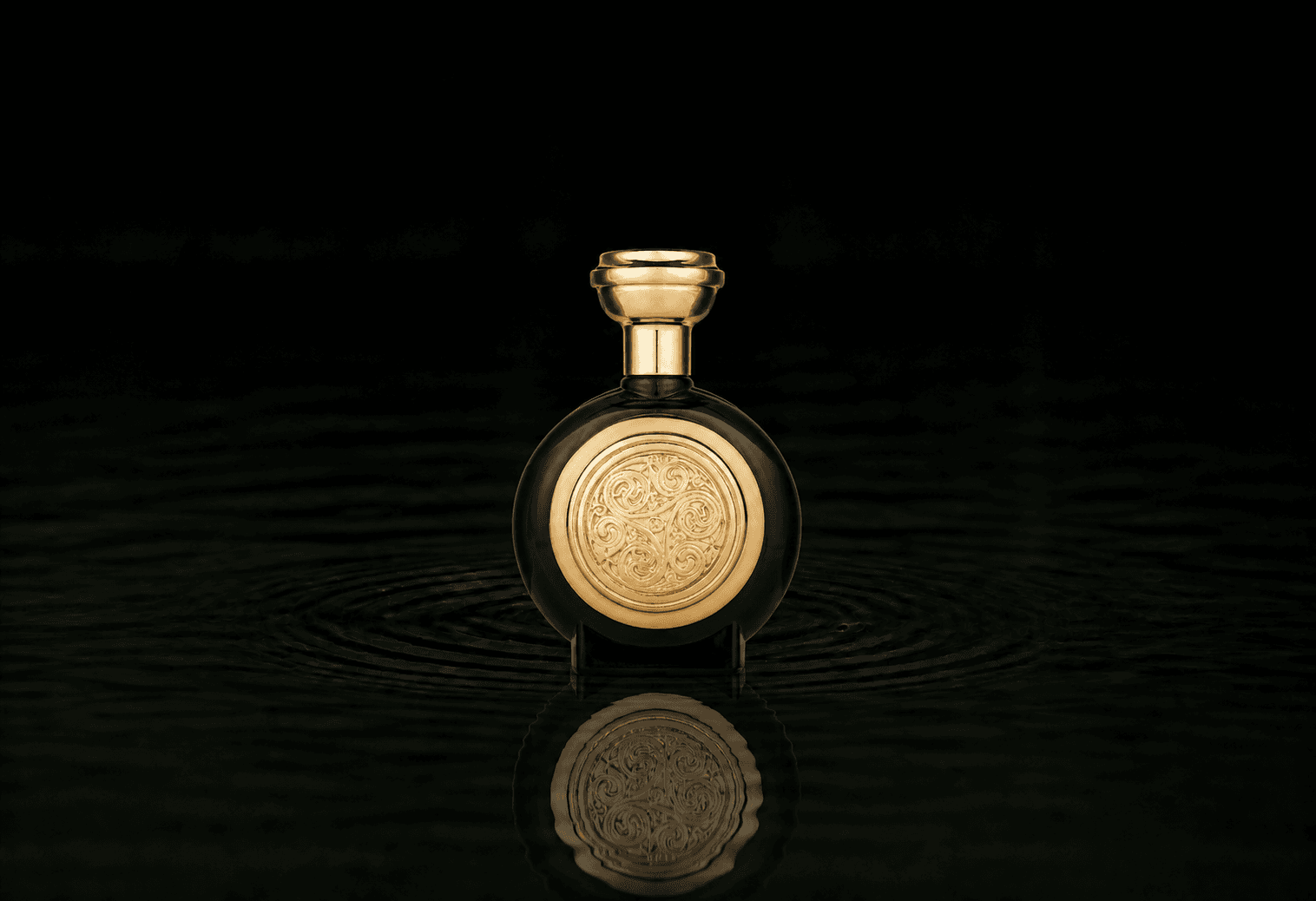 Boadicea The Victorious Angelic fragrance bottle floating above dark water
