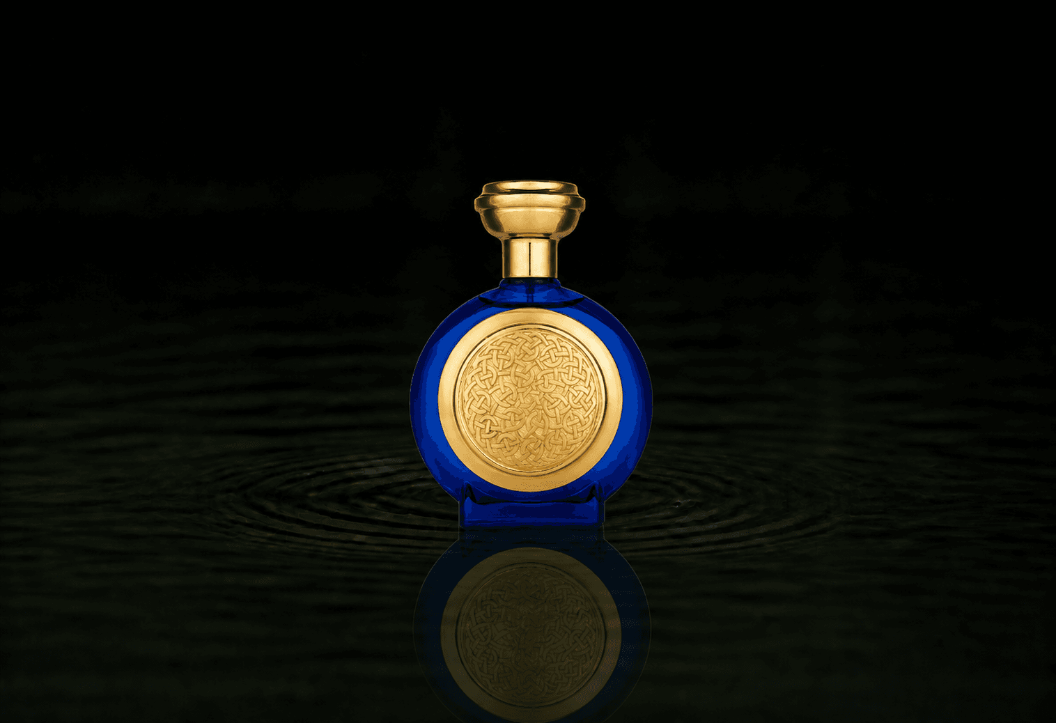 Boadicea The Victorious Azrak parfum fragrance bottle floating above dark water