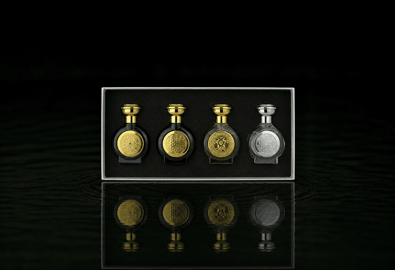 Boadicea The Victorious Best Seller Gift Set fragrance bottle floating above dark water