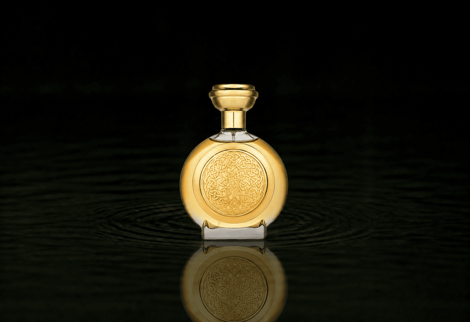 Boadicea The Victorious Nemer fragrance bottle floating above dark water