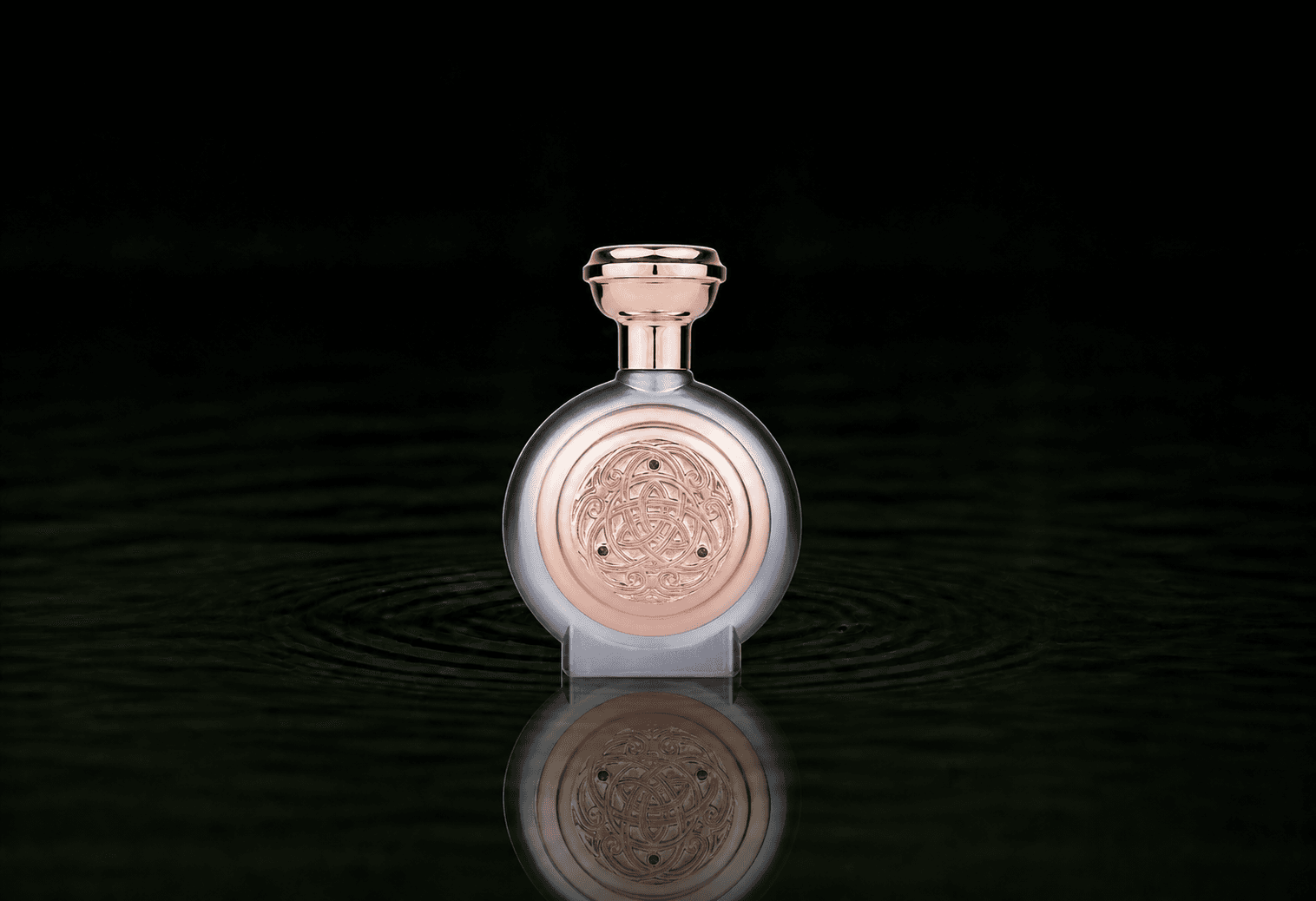 Boadicea The Victorious Resplendent fragrance bottle floating above dark water