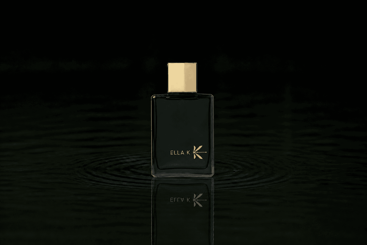 Ella K Camelia K fragrance bottle floating above dark water