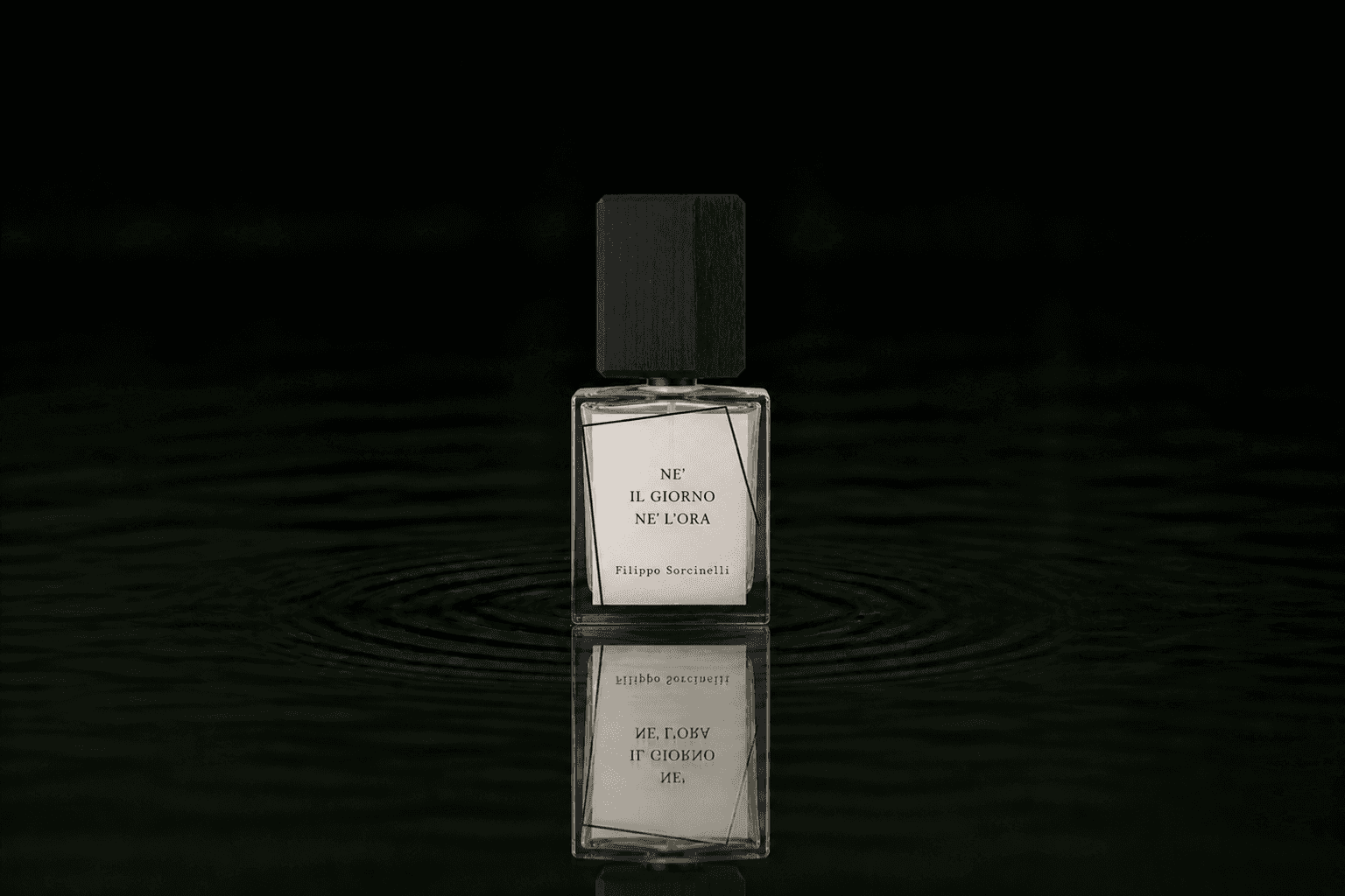 Filippo Sorcinelli Ne' Il Giorno Ne' L'Ora fragrance bottle floating above dark water