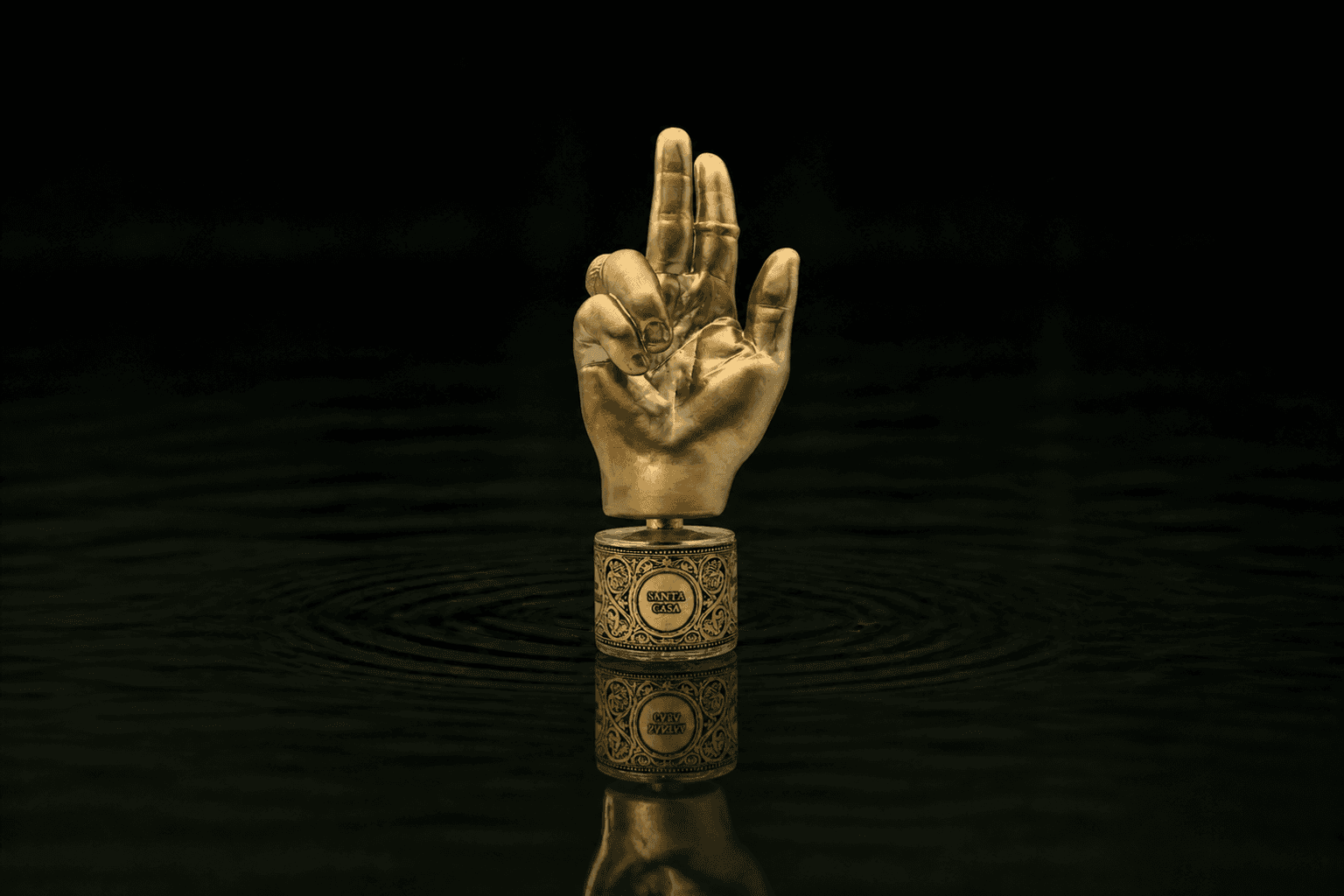 Filippo Sorcinelli Santa Casa fragrance bottle floating above dark water