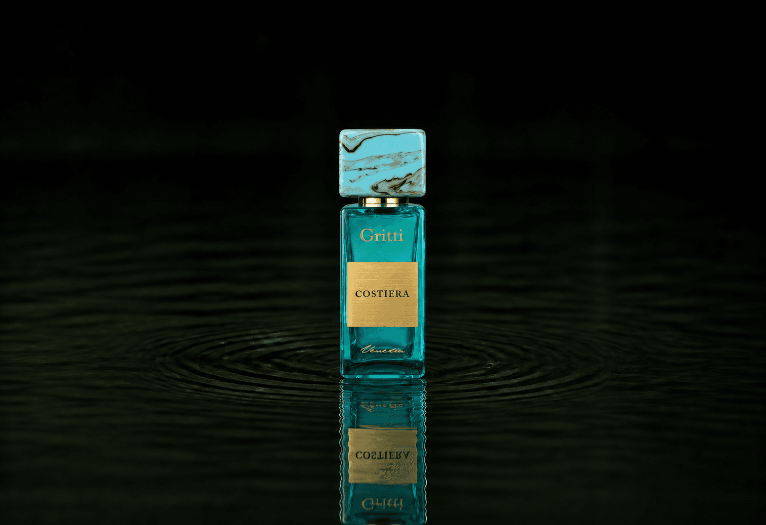 Gritti Costiera fragrance bottle floating above dark water