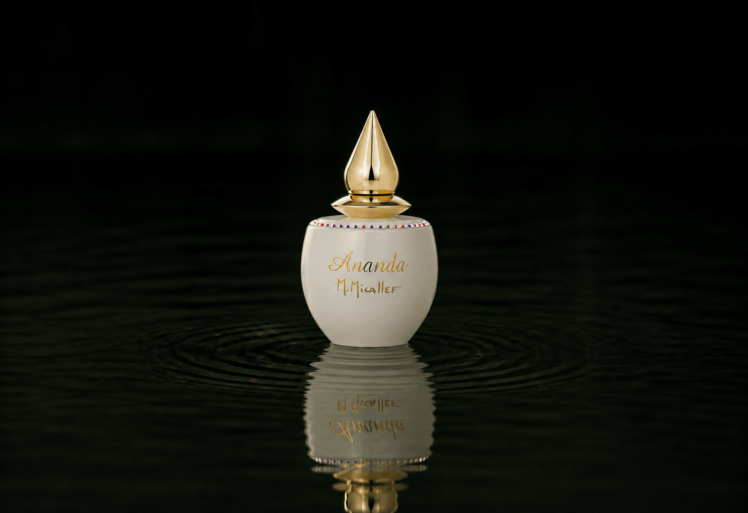 M.Micallef Micallef - Ananda fragrance bottle floating above dark water