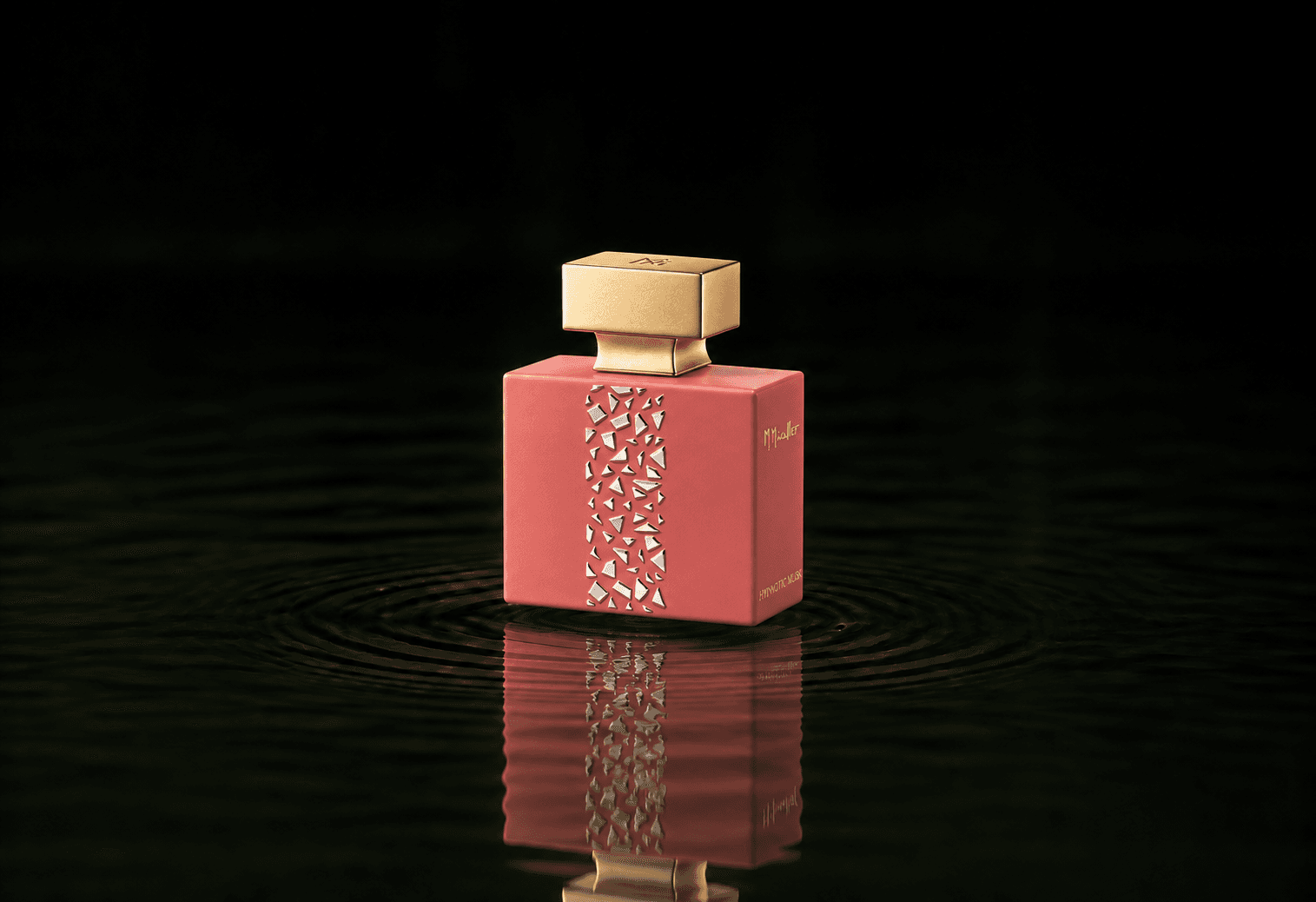 M.Micallef Micallef - Hypnotic Musk fragrance bottle floating above dark water