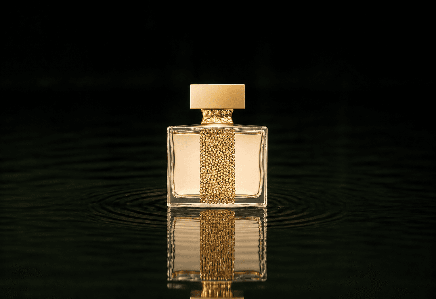 M.Micallef Micallef - Royal Muska fragrance bottle floating above dark water