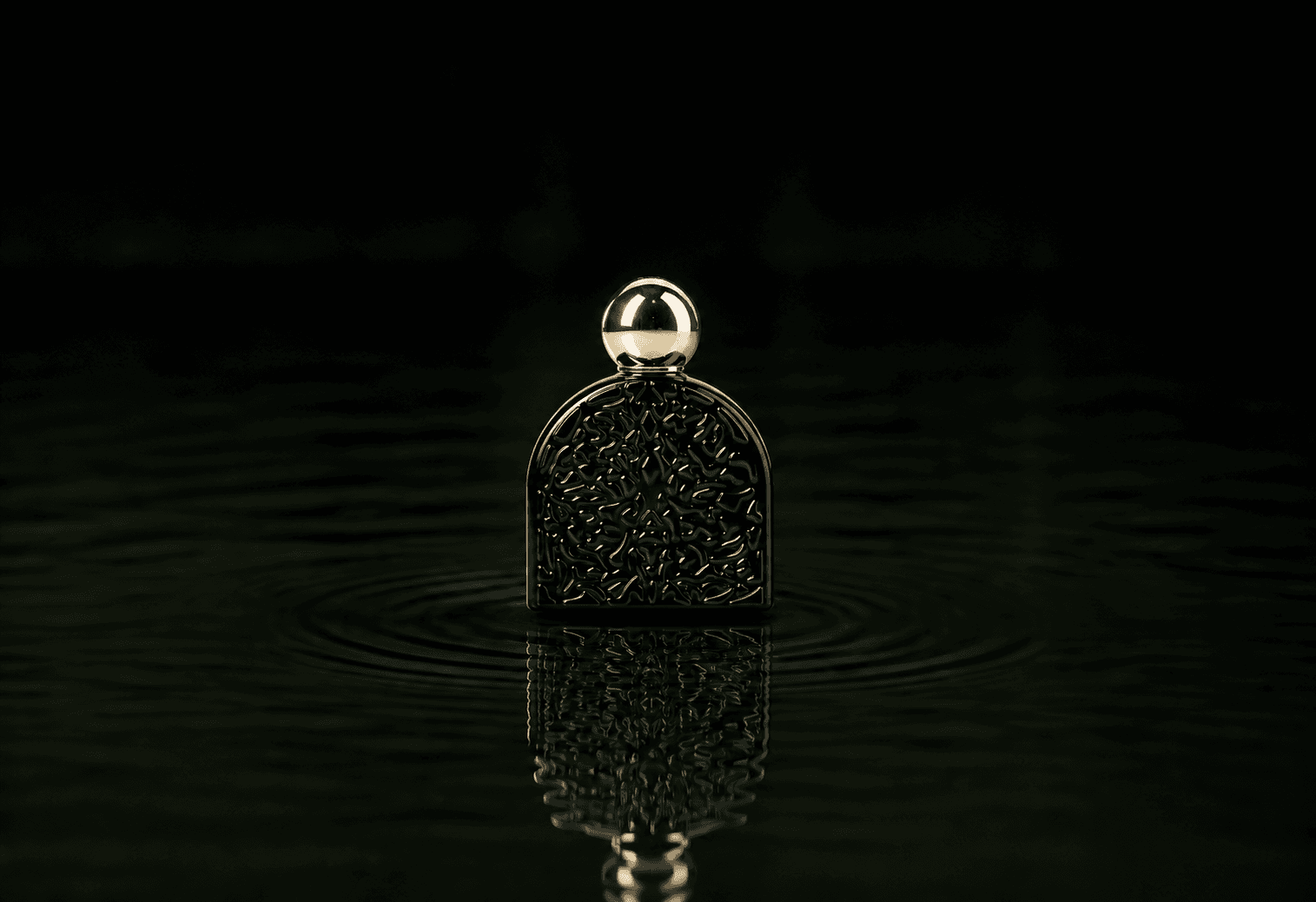 M.Micallef Micallef - Secret Of Love Delice fragrance bottle floating above dark water