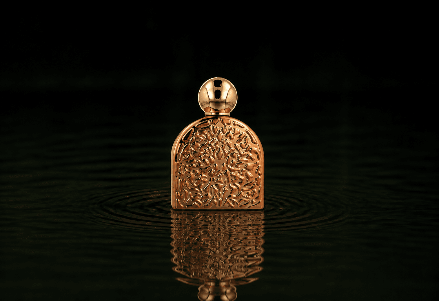 M.Micallef Micallef - Secret Of Love Glamour fragrance bottle floating above dark water