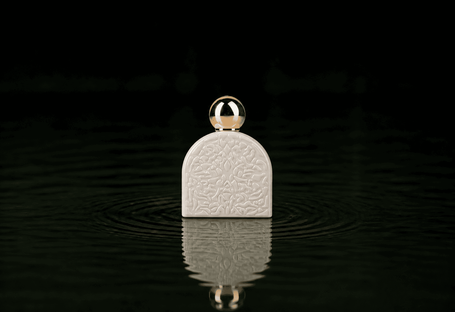 M.Micallef Micallef - Secret Of Love Spiritual fragrance bottle floating above dark water