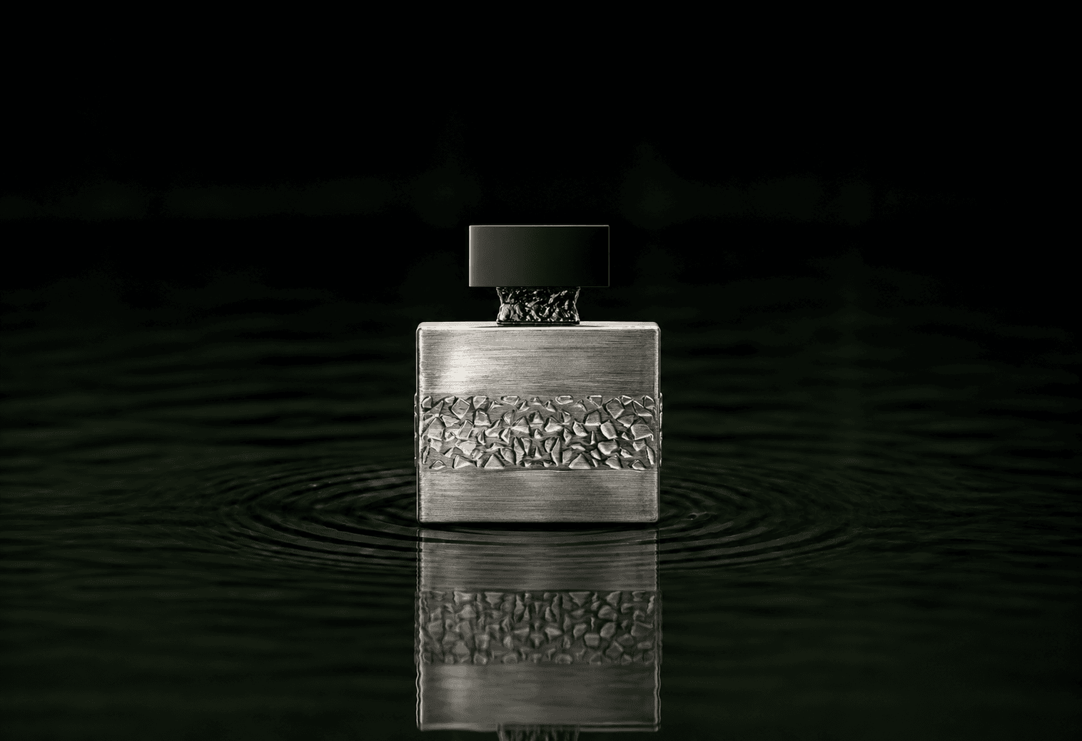 M.Micallef Royal Vintage fragrance bottle floating above dark water